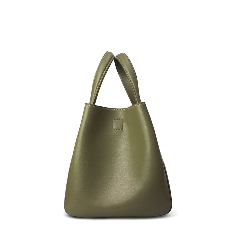 Side view of X NIHILO Eight mini in khaki bag, fashion bag with adjustable shoulder strap, single snap button top closure, and soft gold hardware, luxury cow nappa leather handbag, genuine leather bag