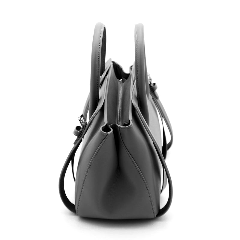 X NIHILO Number 5 medium leather handbag. The shoulder strap is attached to the harness, remove the harness completely for a different look and carry by the top handle. 