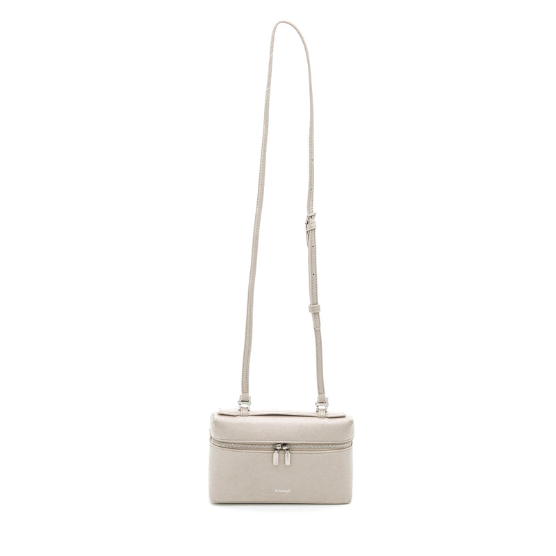 X NIHILO Number 2 leather crossbody handbag. Made in soft calf leather, top handle, double zipper and adjustable shoulder strap that can be removed and carry with top handle for a lady-like look.