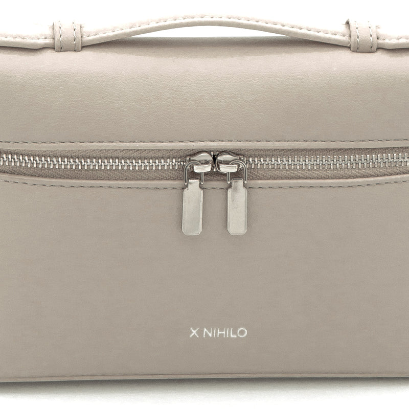 X NIHILO Number 2 leather crossbody handbag. Made in soft calf leather, top handle, double zipper and adjustable shoulder strap that can be removed and carry with top handle for a lady-like look.