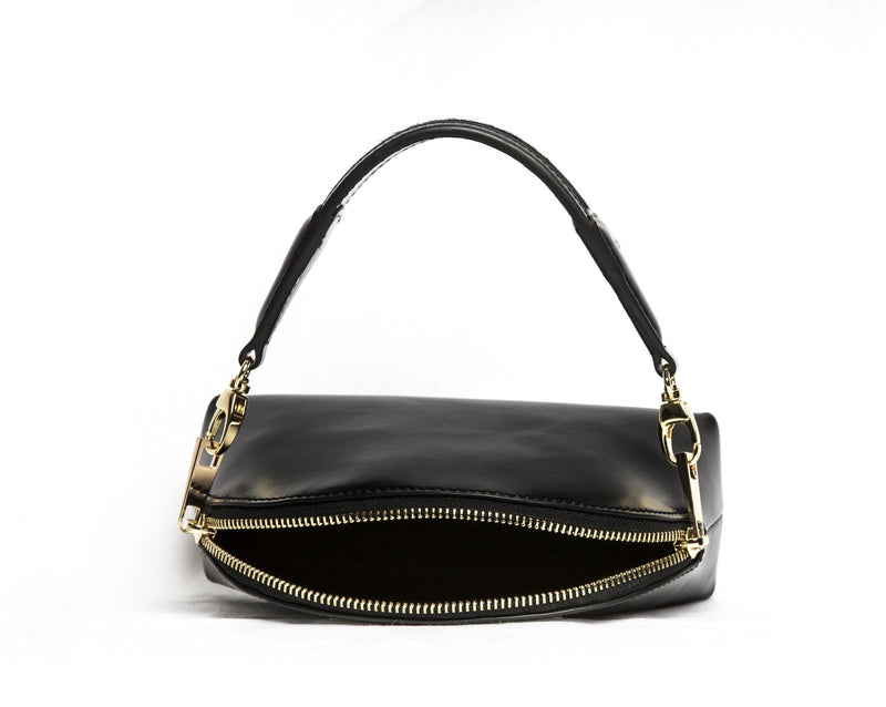 X NIHILO Stella in black with soft gold hardware, fashion bag with zip top closure and removable handle, luxury black box leather with pony hair (cowhide) handbag, genuine leather bag
