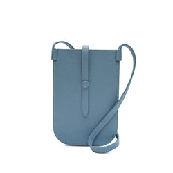 Rectangular Chambray blue phone pouch with opening on top and a attached shoulder strap.