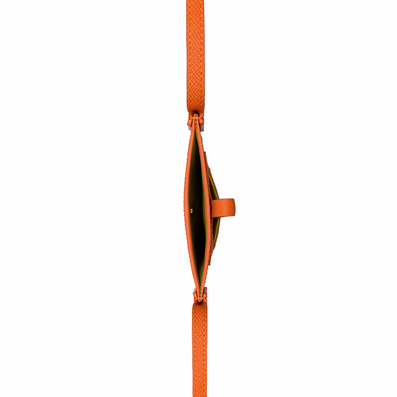 Rectangular Tangerine orange phone pouch with opening on top and an attached shoulder strap. Top View.