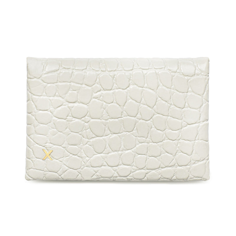 White croc print luxury leather cardholder with logo X protruding in gold on the bottom left corner.