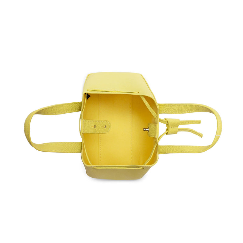Top and inside view of mini genuine lime leather bucket shape crossbody with handles and leather pull-strings, textured cow leather with silver hardware, fashion bag