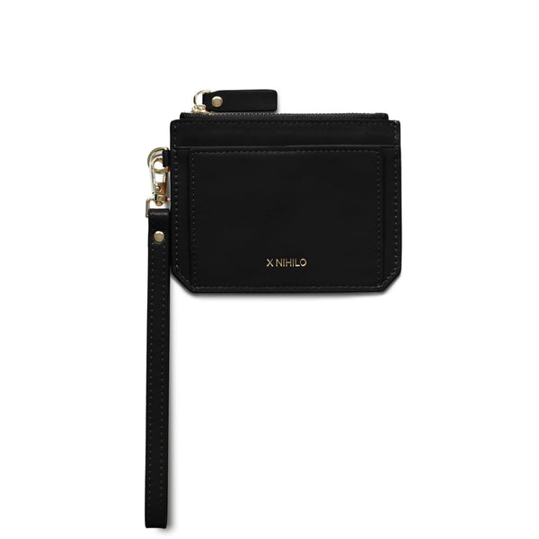 Black genuine cow nappa leather wallet and coin purse with detachable leather strap and logo X NIHILO embossed in gold in the bottom centre.